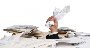 Businessman Buried in Paperwork